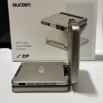 Aurzen ZIP Tri-Fold DLP Truly Mini Projector. Pocket Size. Zero-Lag Focus. One-Click Screen Mirroring. Full-Screen Mode. Type-C Fast Charging. 5.000mAh Battery. Indoor Outdoor Portable Projector.Gold photo review