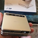 Aurzen ZIP Tri-Fold DLP Truly Mini Projector. Pocket Size. Zero-Lag Focus. One-Click Screen Mirroring. Full-Screen Mode. Type-C Fast Charging. 5.000mAh Battery. Indoor Outdoor Portable Projector.Gold photo review